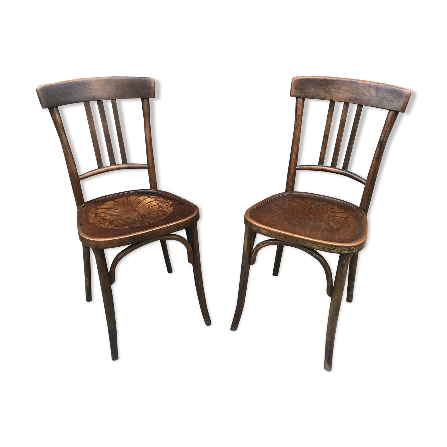 Pair of brasserie bistro chairs with seashell on seat