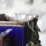 Slip vase decorated with flowers