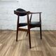 Vintage Scandinavian armchair in teak and black skai, 60s