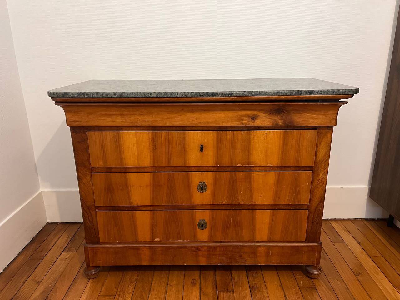19th-century commode with a marble top