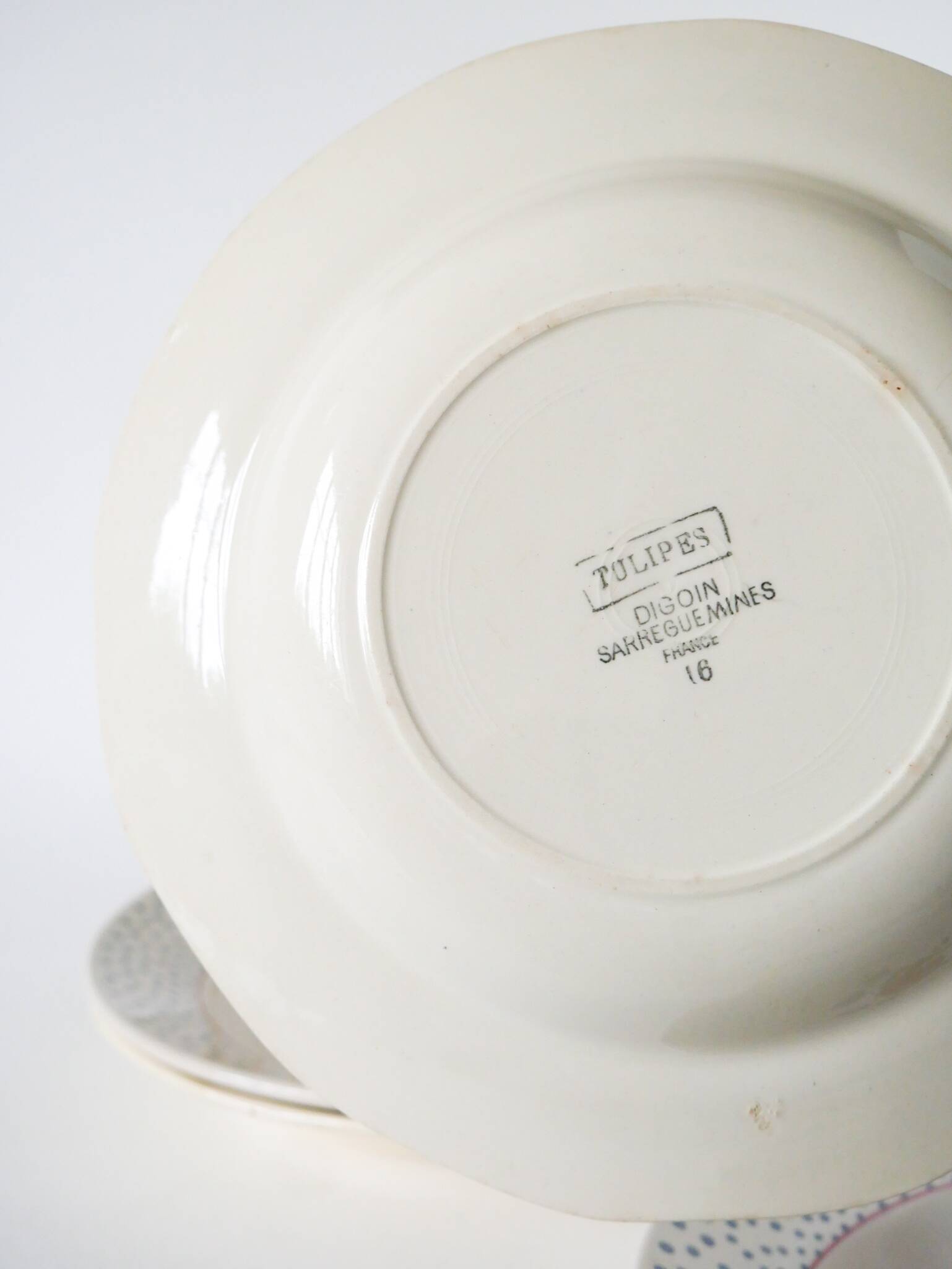 Set of 4 mismatched Digoin Sarreguemines floral soup plates