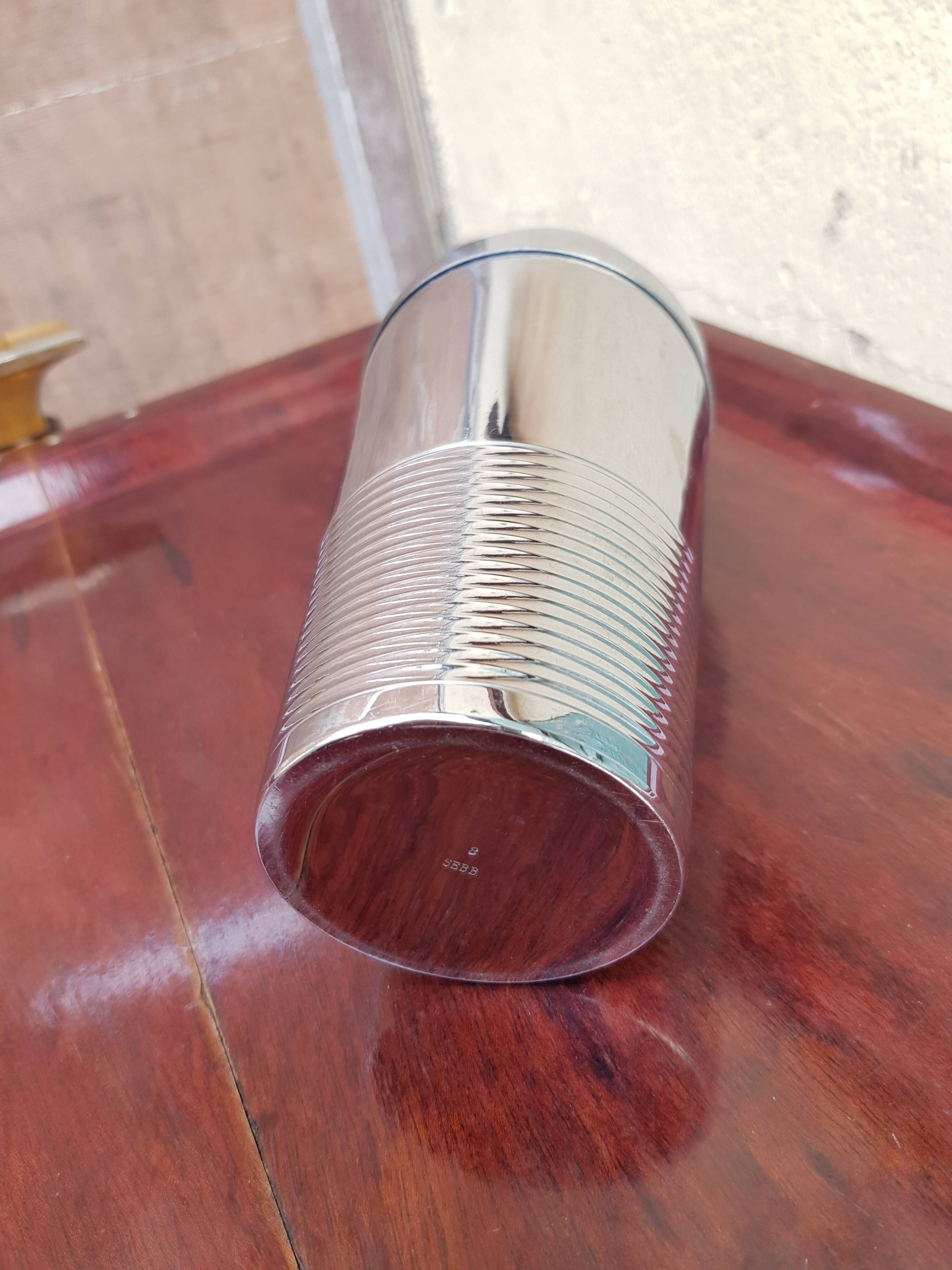 Old silver metal shaker