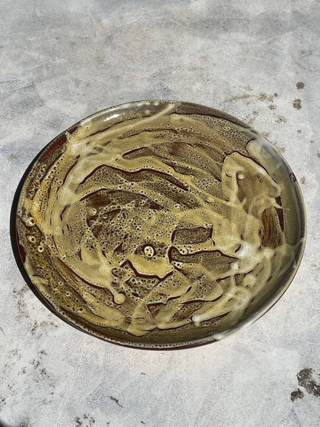 Pair of green glazed stoneware ceramic plates