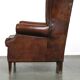 Large sheepskin wing chair with excellent colour and great seating comfort