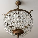 Old chandelier with bronze stamps