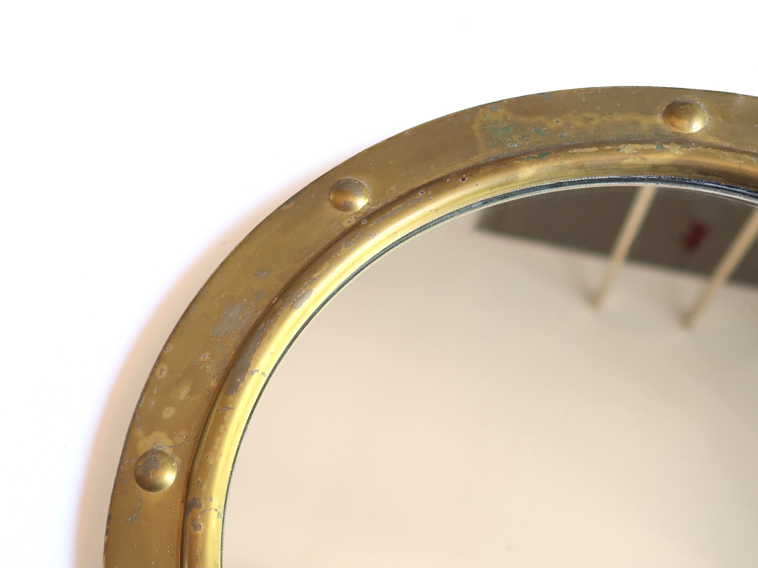Round brass porthole mirror, 60s