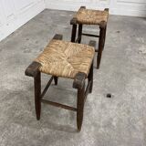 A pair of 1950s straw stools.