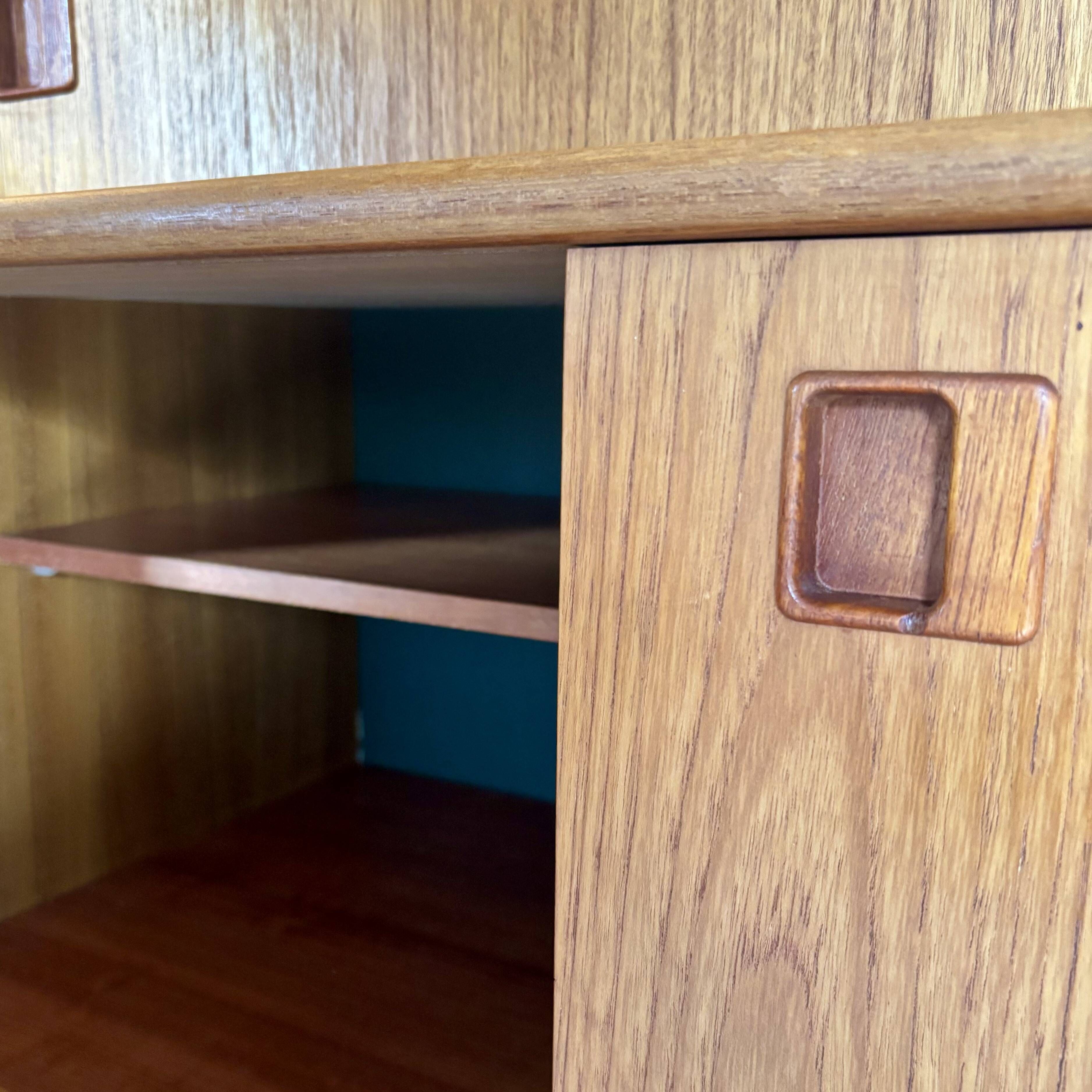 Scandinavian highboard in blonde teak with integrated bar - 60s