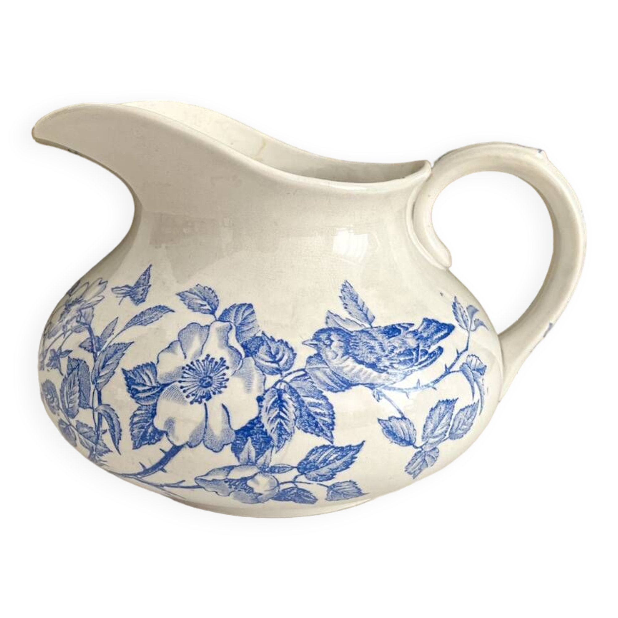 Antique chubby ironstone jug with floral and bird decoration