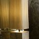 Beige marble stucco base, Houles white ecru fringed lampshade.