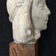 Bronze-middle-aged woman's head in plaster
