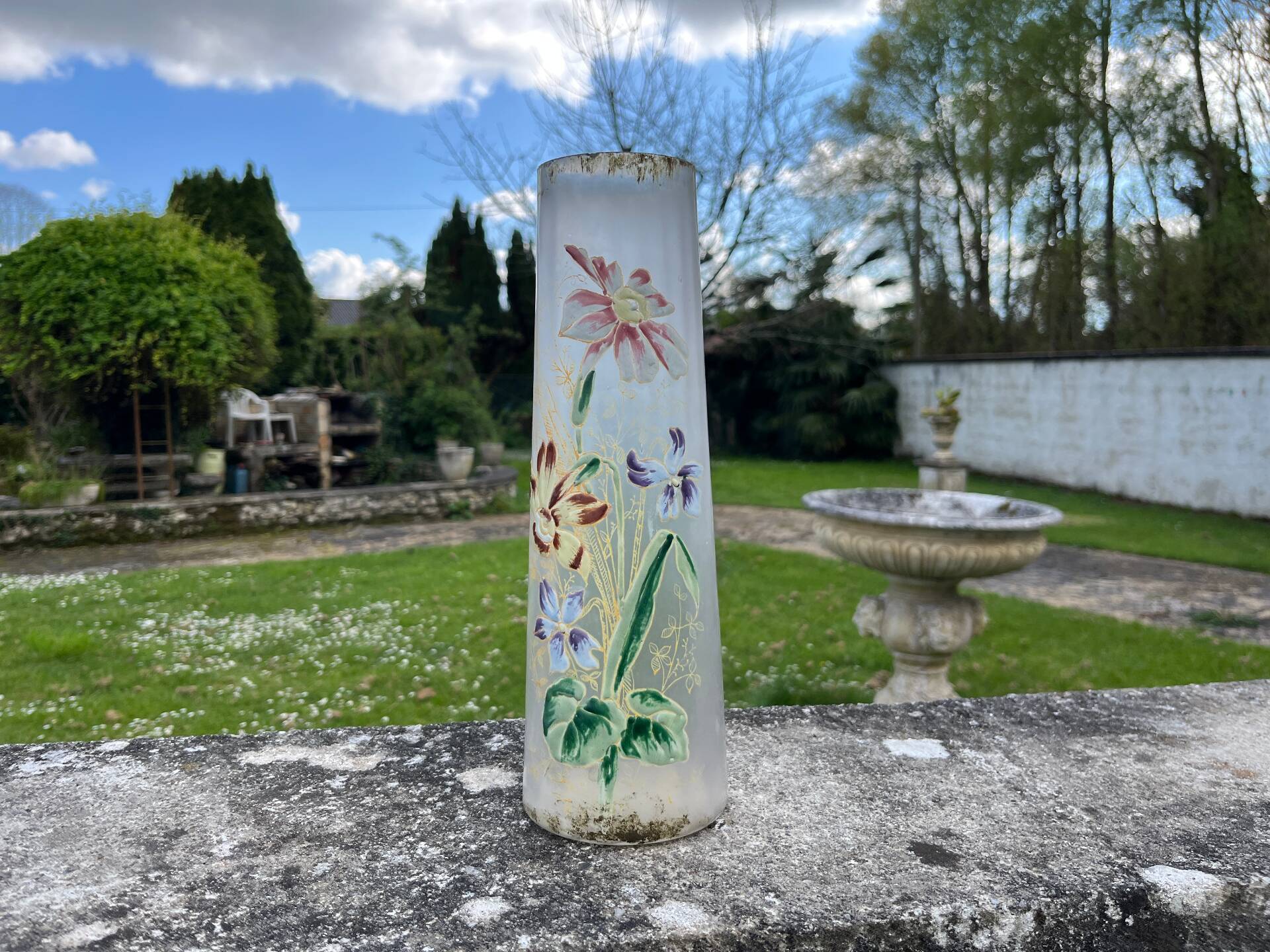 Cylindrical Art Nouveau vase with enamelled decoration of violets.
