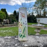 Cylindrical Art Nouveau vase with enamelled decoration of violets.