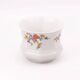White porcelain pot (cache-pot) with floral patterns from Wunsiedel.