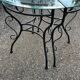 Glass and iron table with two side tables and 8 chairs