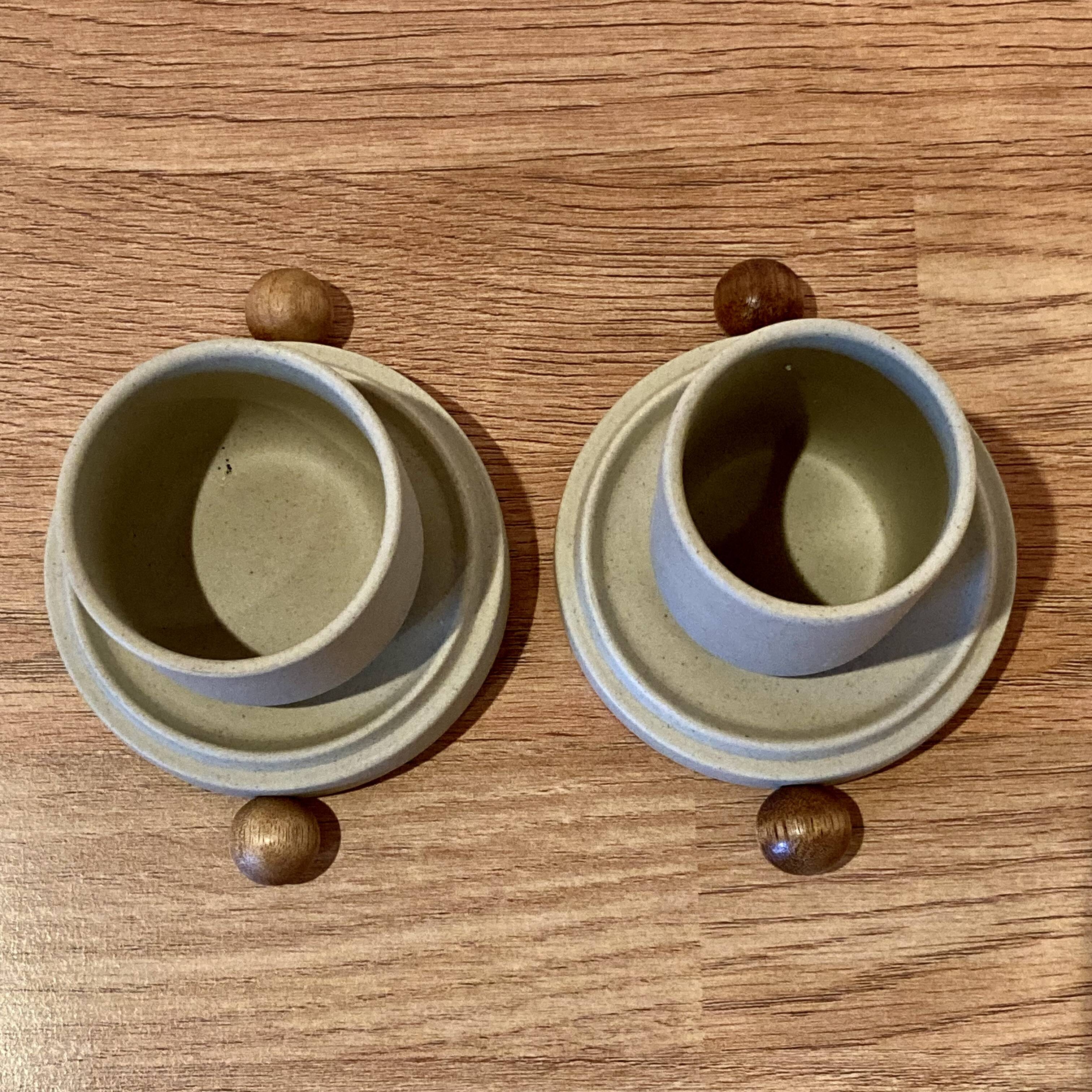 A pair of Scandinavian design candle holders.
