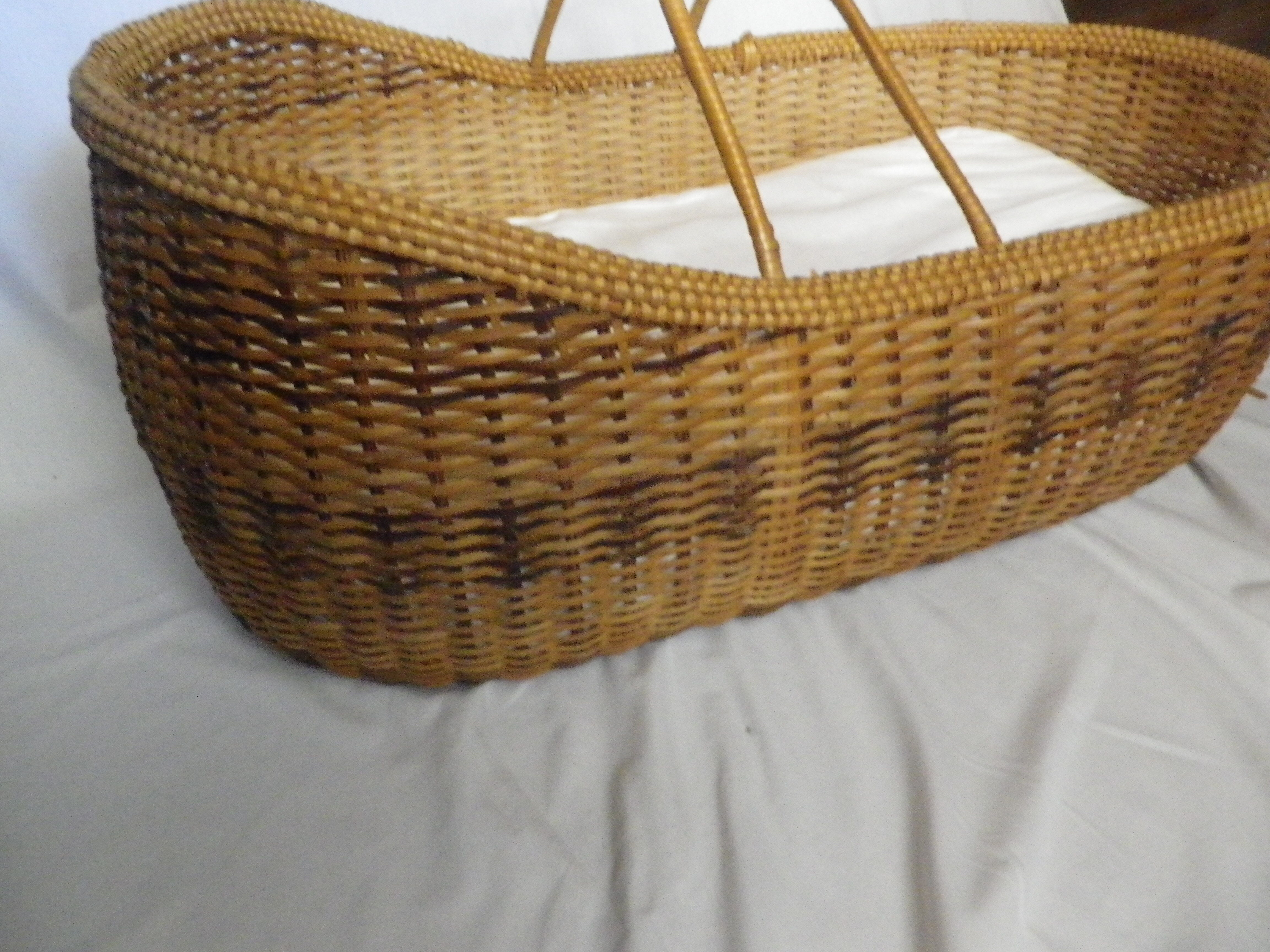 Antique wicker bassinet for babies