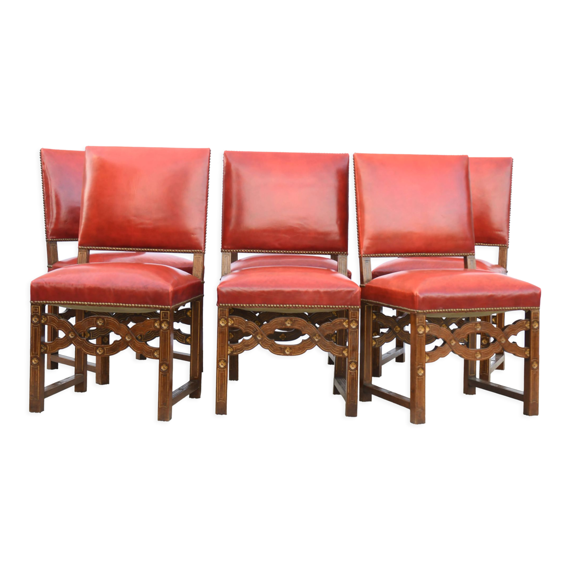 6 red leather chairs