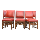 6 red leather chairs