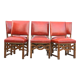 6 red leather chairs