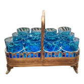 Blue shot glasses in baskets