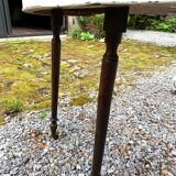 White lacquered oak table, richly carved central leg. Late 19th century