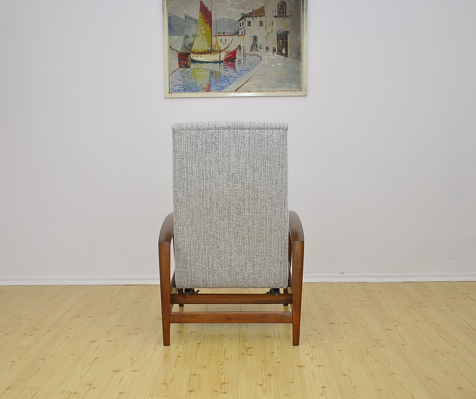Mid-century armchair with folding footrest, 1960s