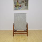 Mid-century armchair with folding footrest, 1960s