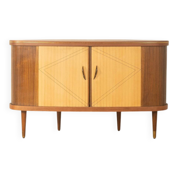 Cabinet de bar élégant des années 1950 avec compartiment rotatif et dos en miroir.