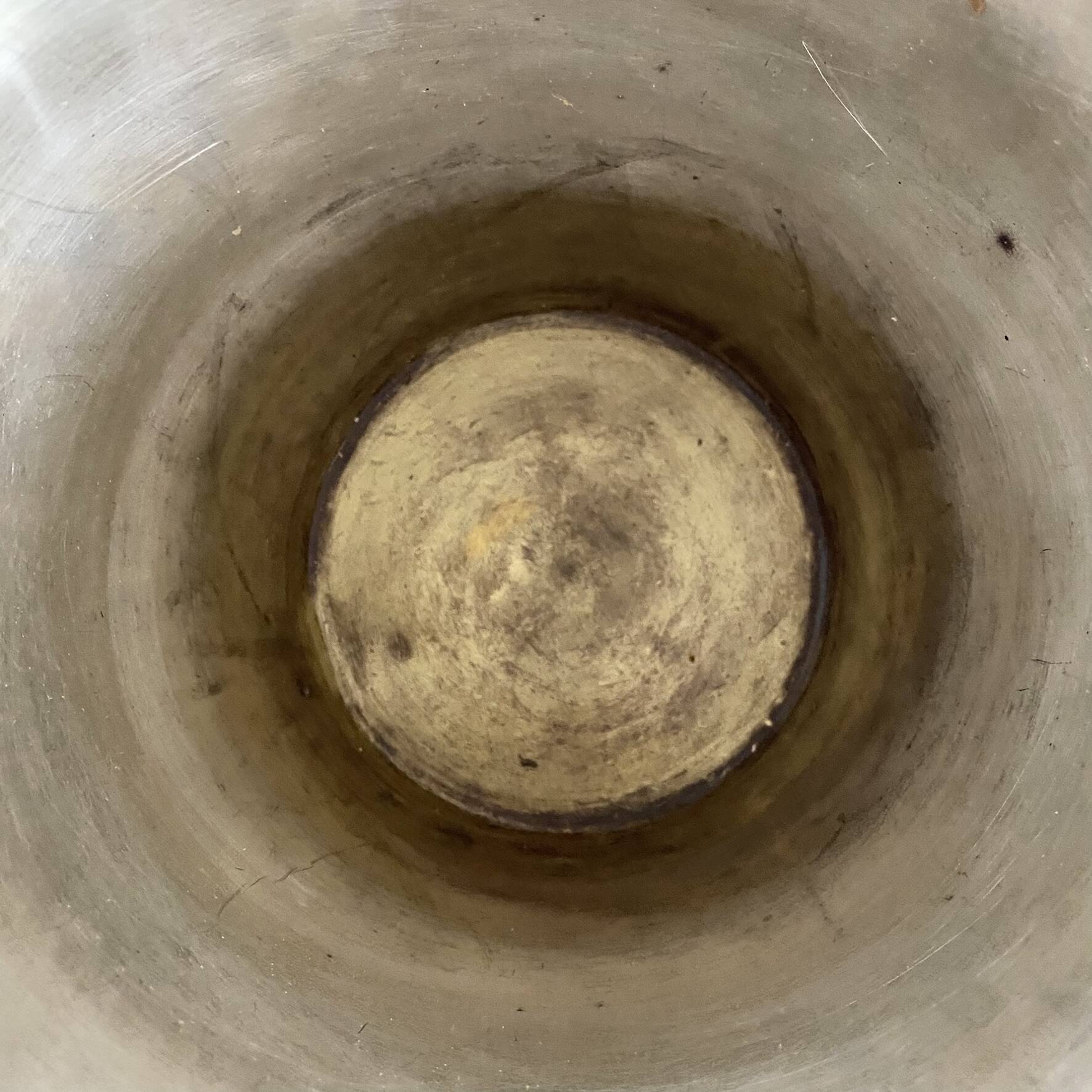 Antique champagne bucket with shell handles.