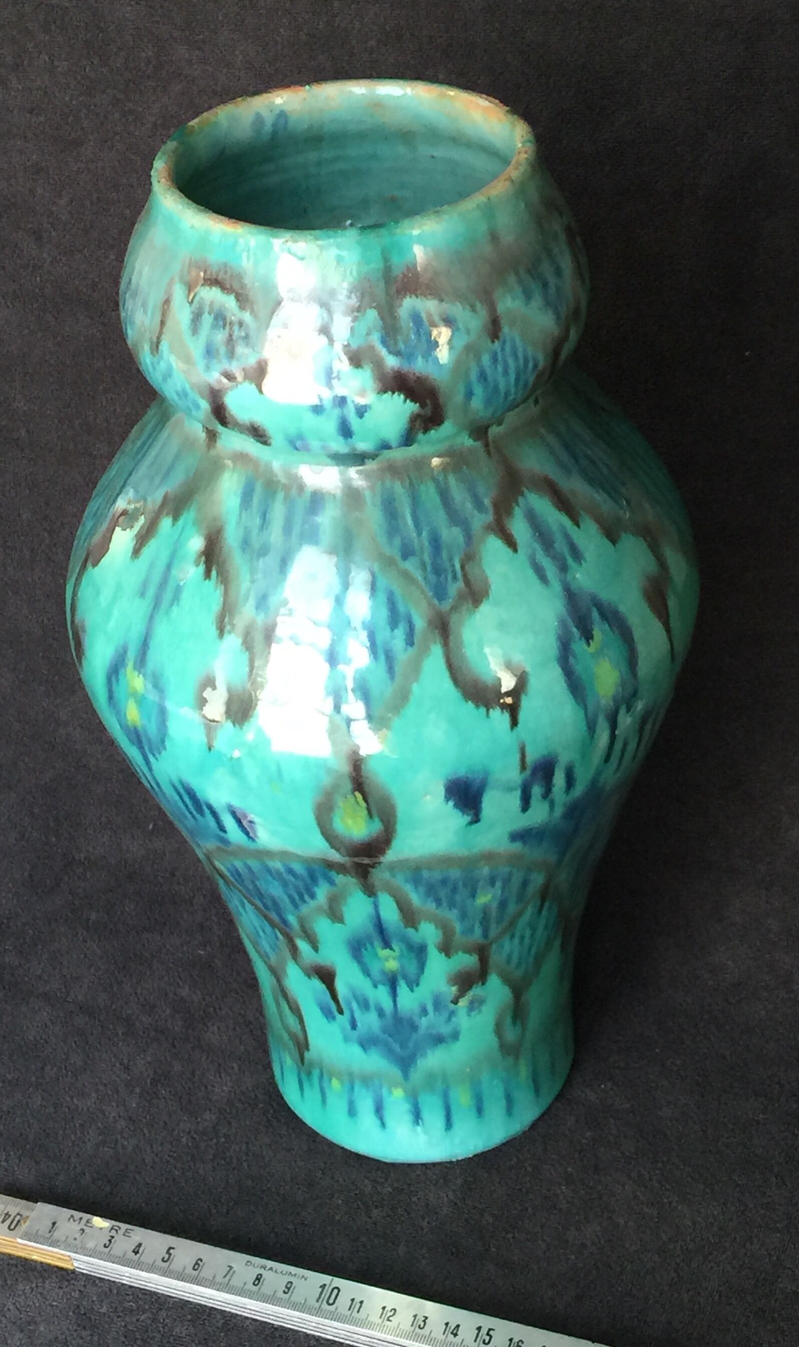 Enamelled ceramic vase, with a flaming blue-green décor