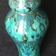 Enamelled ceramic vase, with a flaming blue-green décor