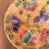 Round earthenware dish decorated with fruit in Sarreguemines slipware