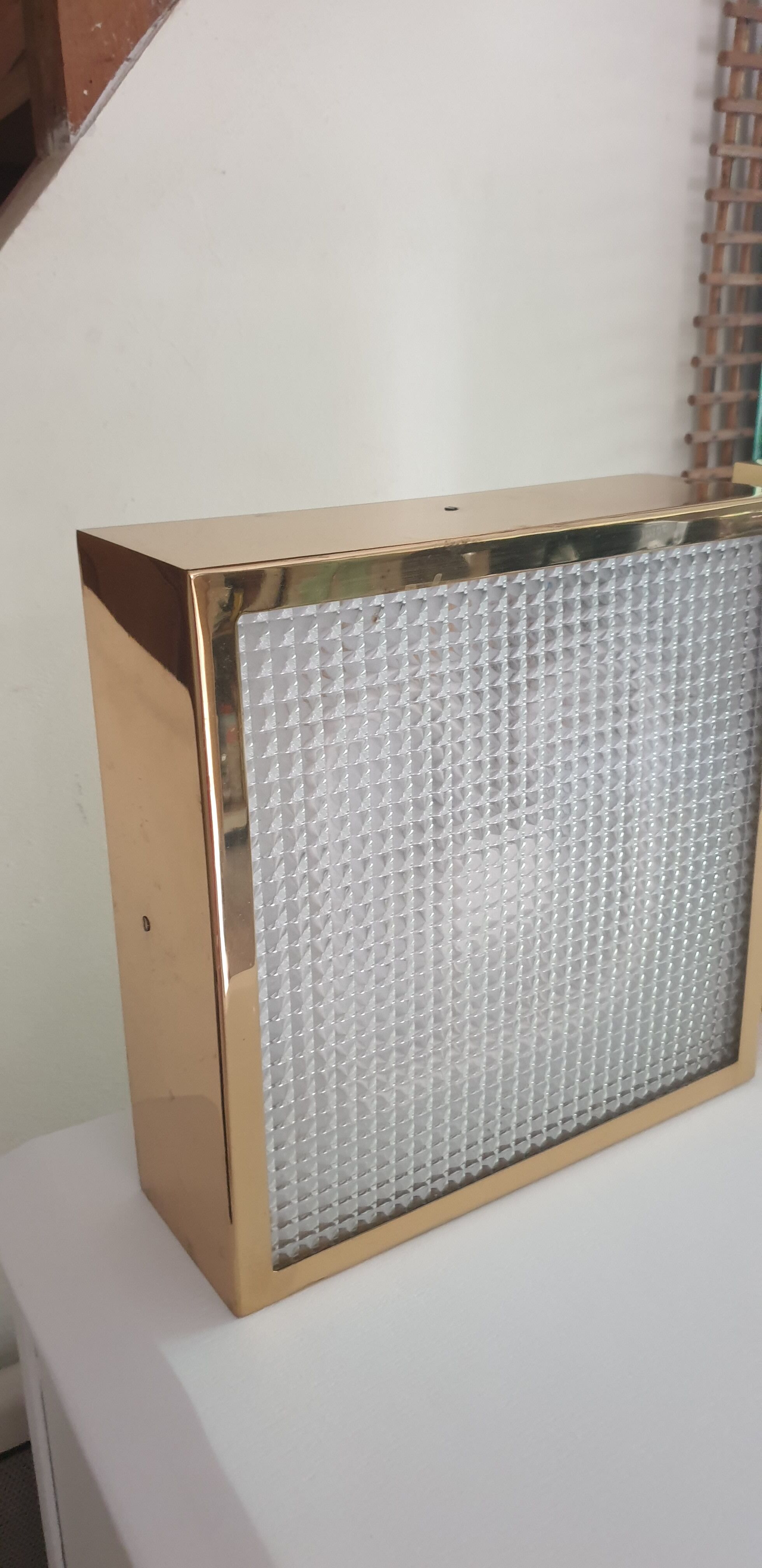 Pair of gold square wall light