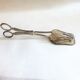 Wrought silver plated cake clips