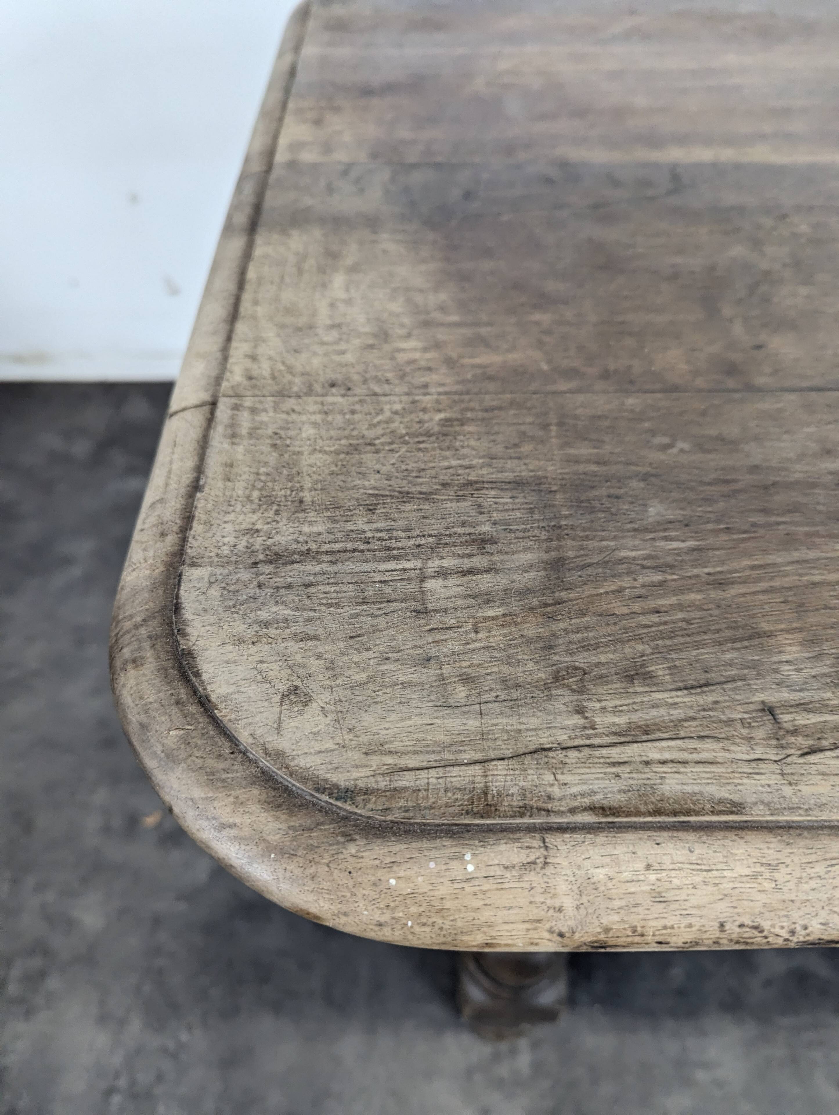 Louis XIII oak table with baluster legs and H stretcher.