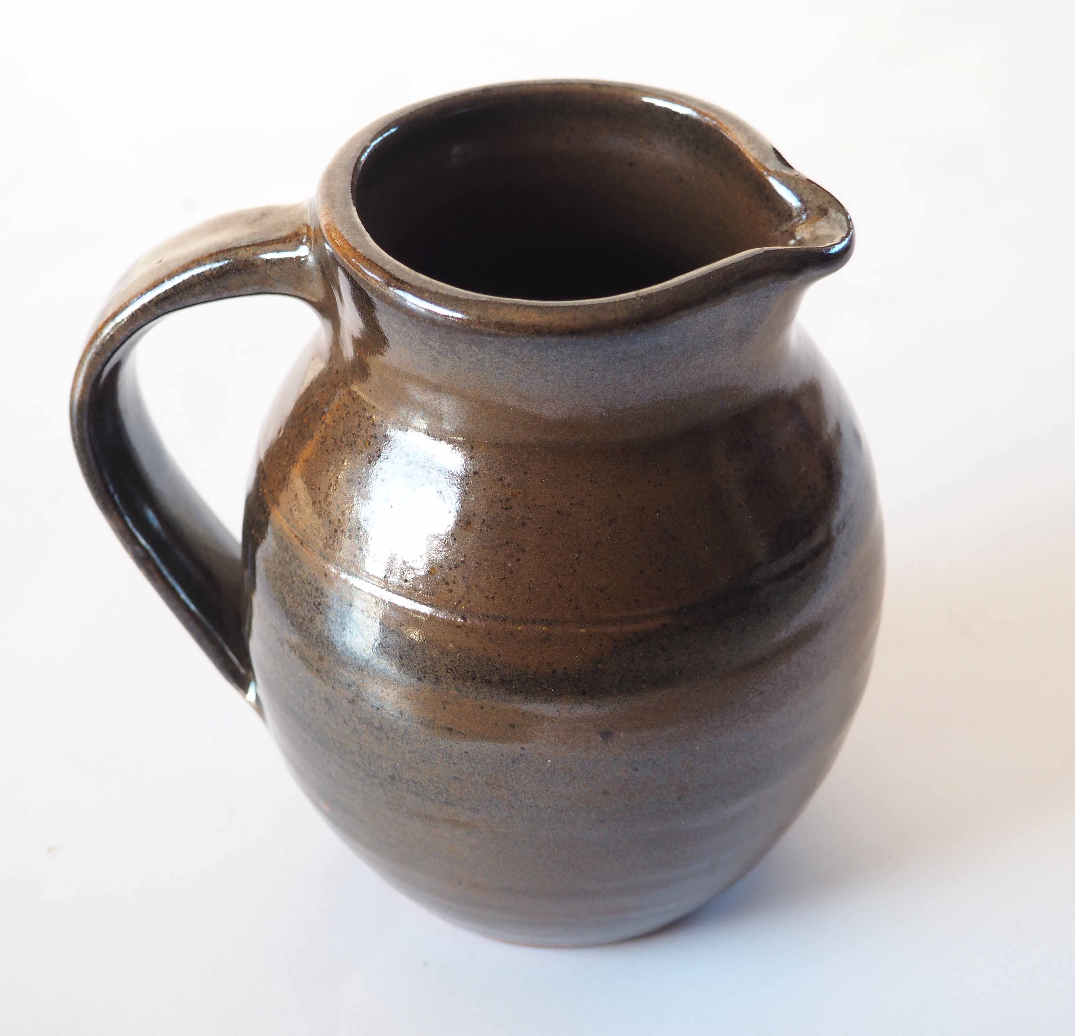 Duo of sandstone pitchers