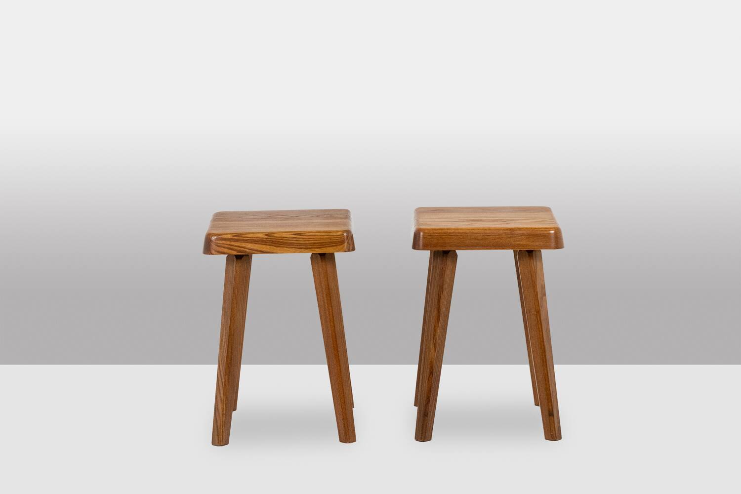 Pierre Chapo. Pair of stools in natural blond elm. 1970s.