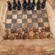 Chess table with handmade drawers made of olive wood