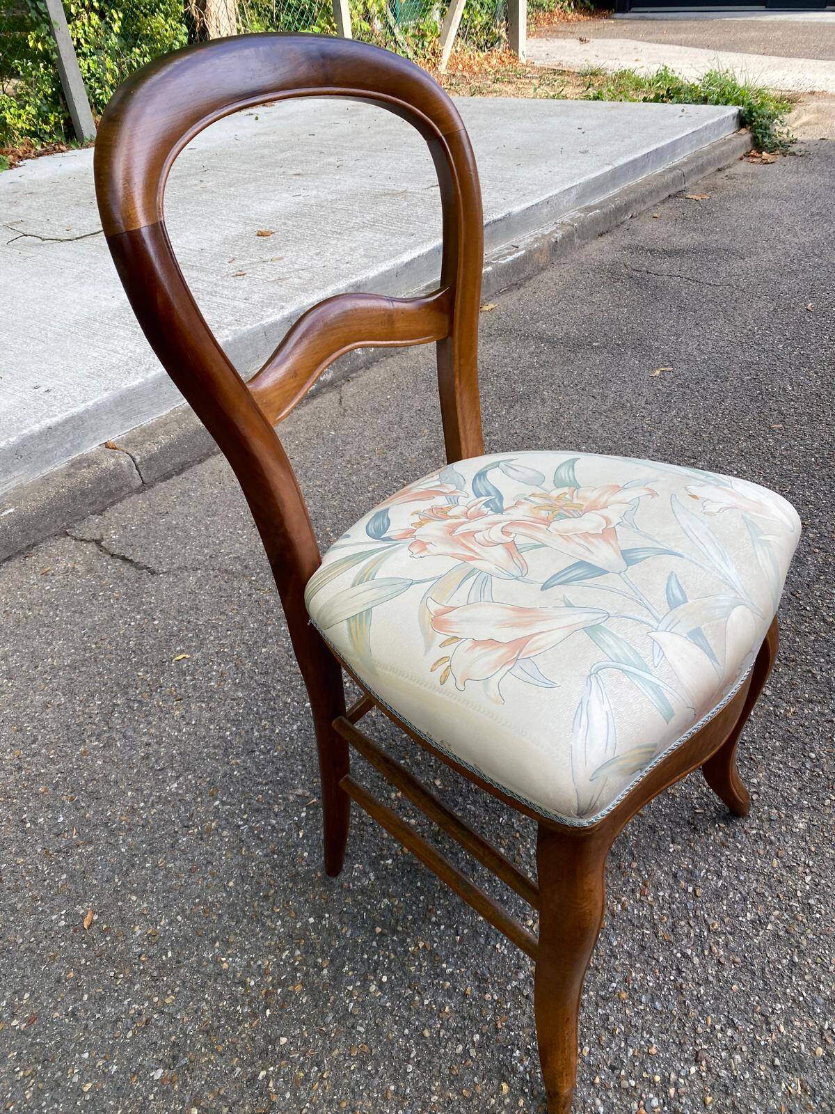 Antique flying chair in Restoration / Louis-Philippe style made of solid wood.