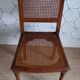 Art Deco caned chair with bronze ornaments.