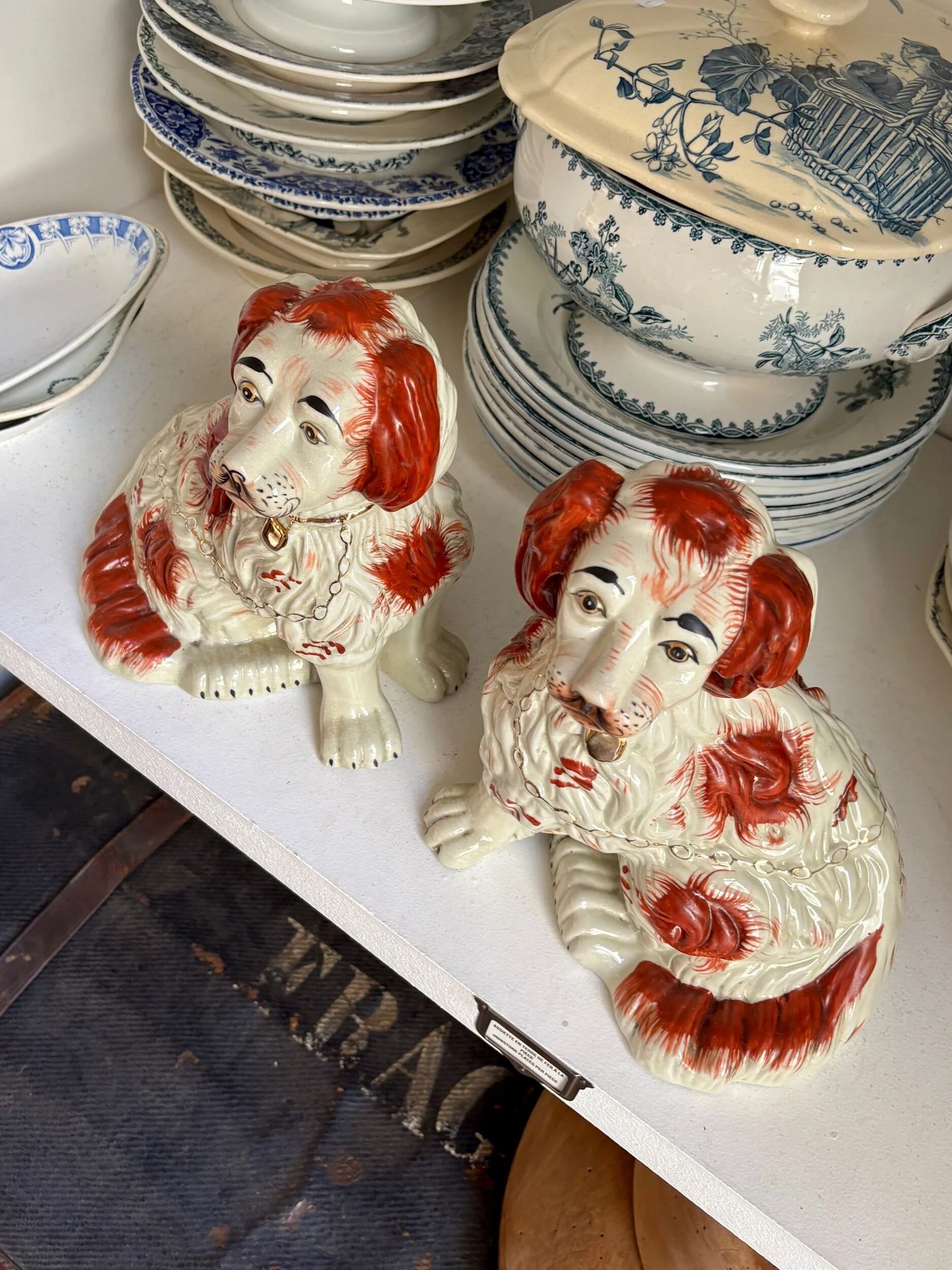 Pair of red Cavalier King Charles dogs in Staffordshire pottery, 19th century.