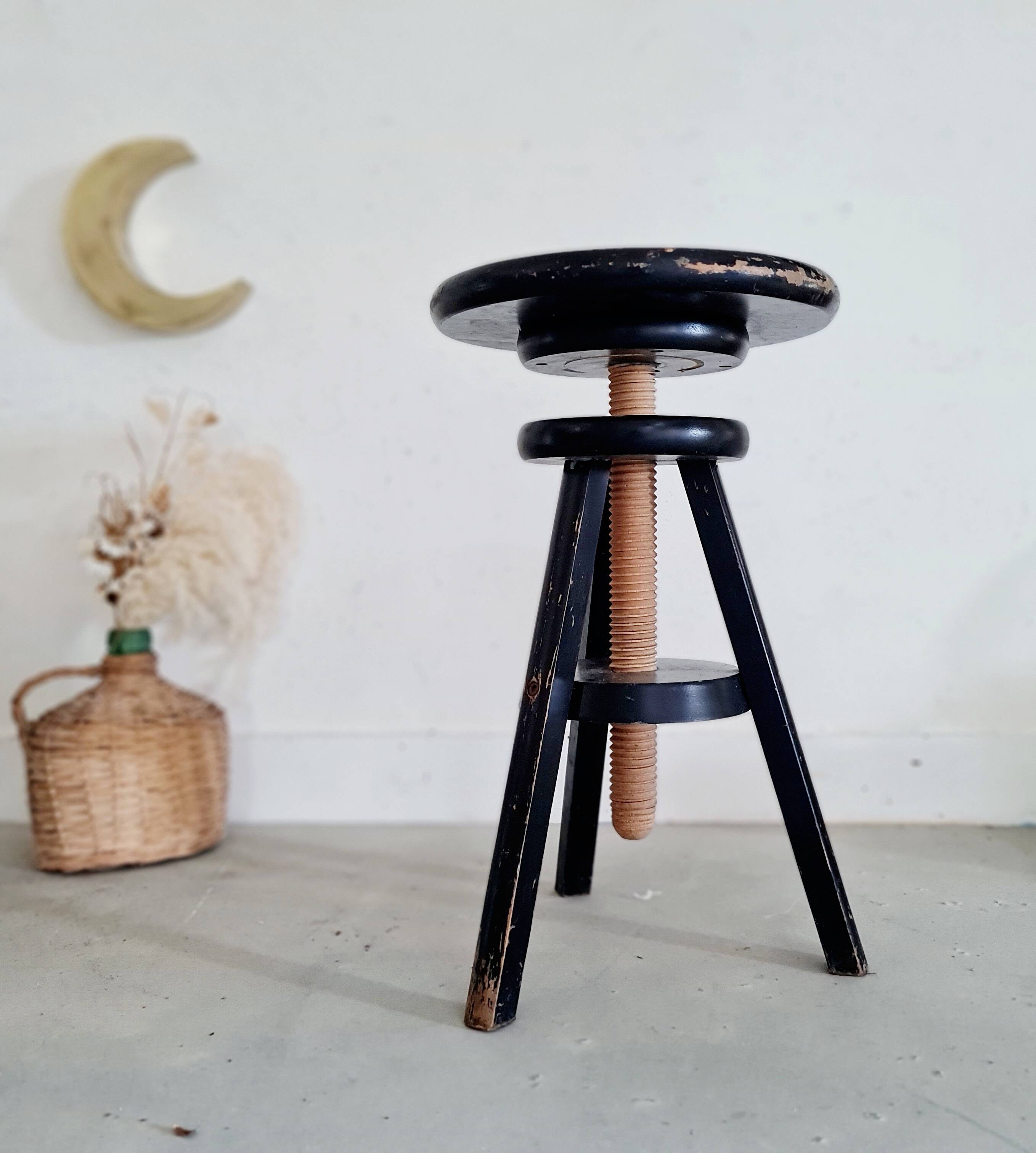 Antique black piano stool in adjustable wood