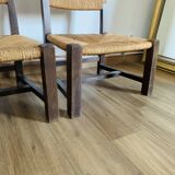 Pair of low wooden and straw armchairs