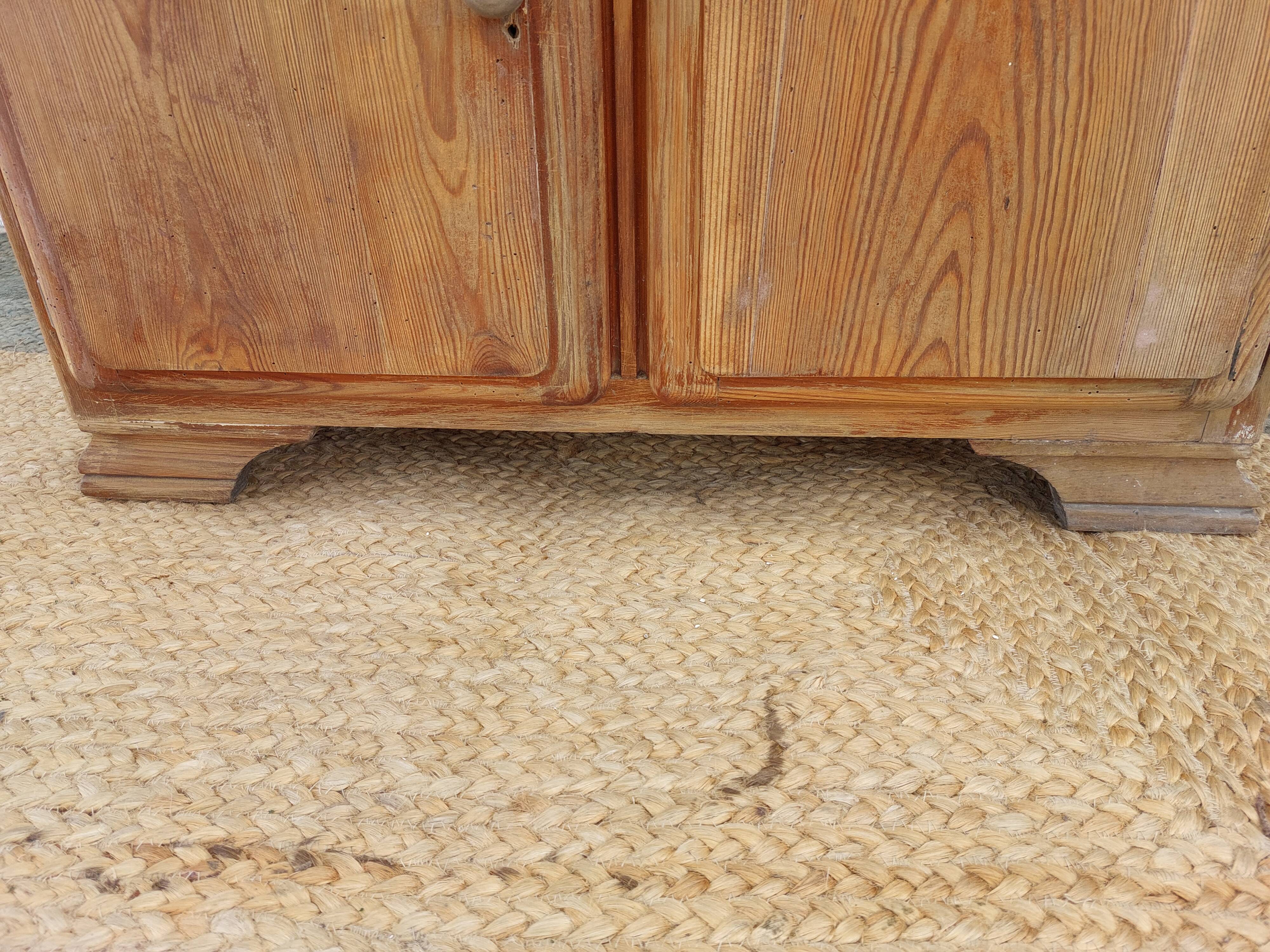 Vintage wooden buffet with a marble top.