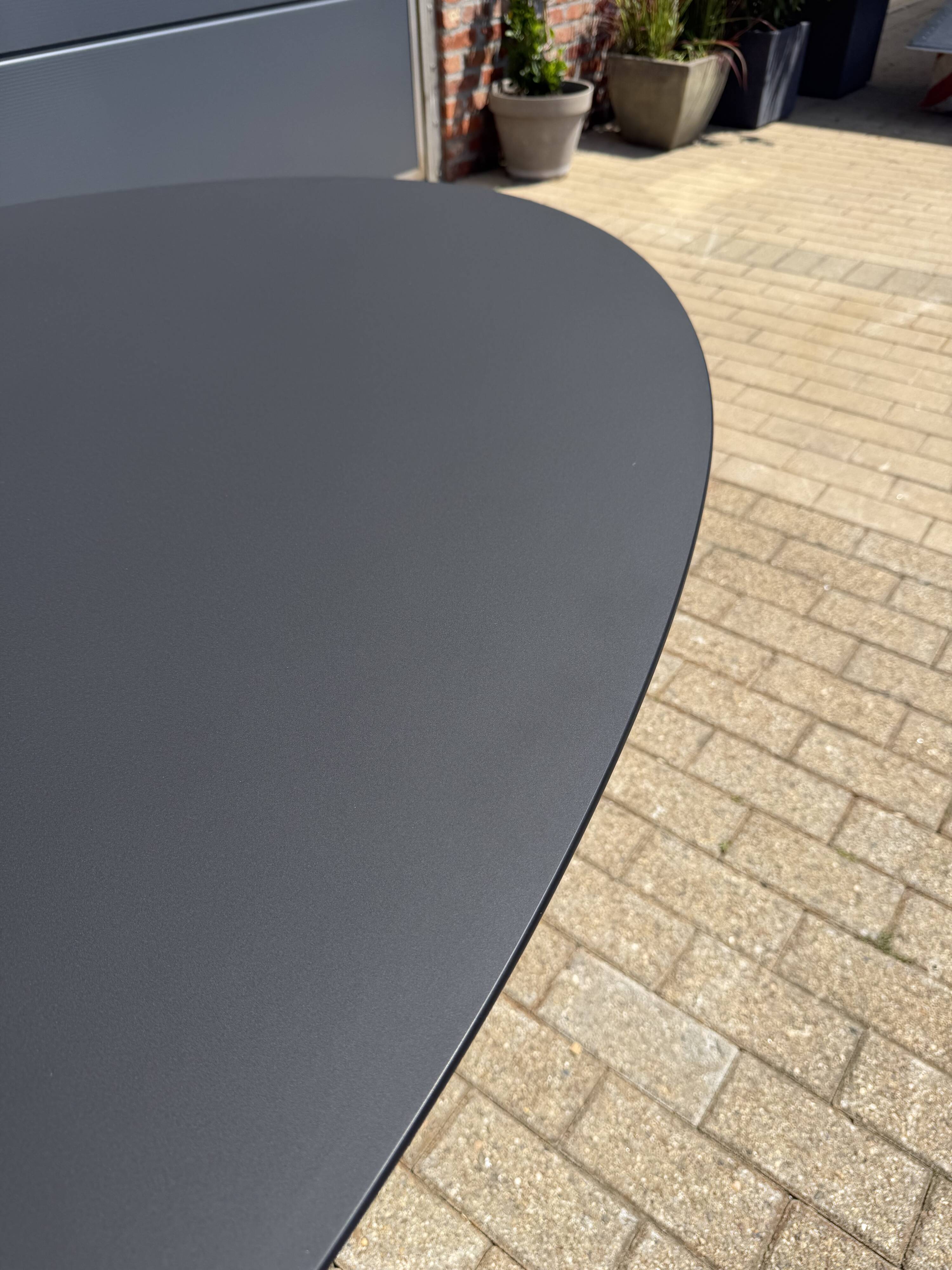 Knoll Tulip oval dining table 198/244cm black Feniks laminate
