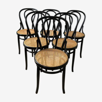 Curved wood chairs and canning