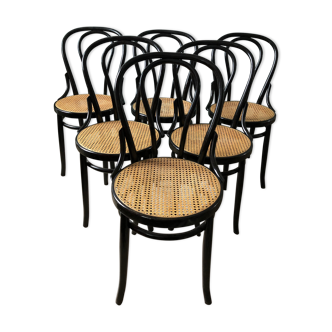 Curved wood chairs and canning