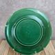 Set of 2 green earthenware dessert plates with vine decoration.