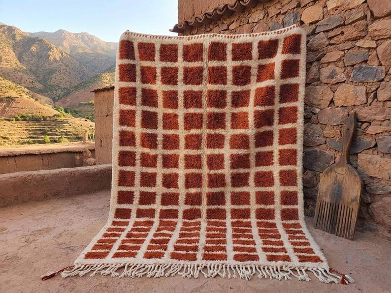 Ecru Moroccan rug with geometric patterns 200cm x 270cm.